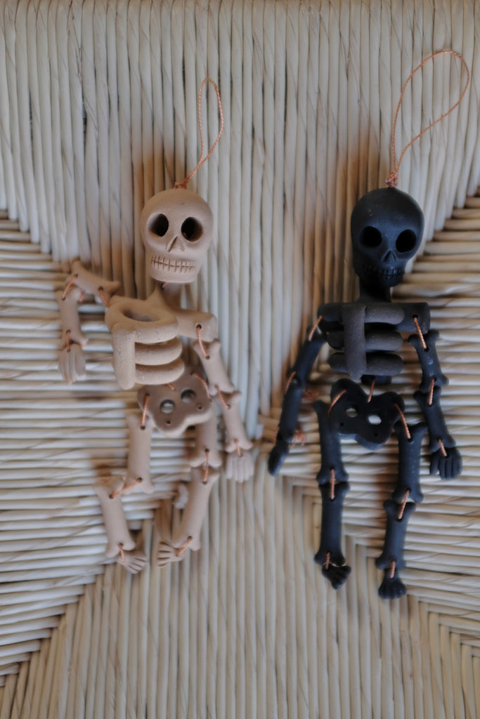 Small hanging clay skeleton